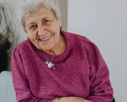depositphotos_547284666-stock-photo-elderly-woman-gray-hair-purple